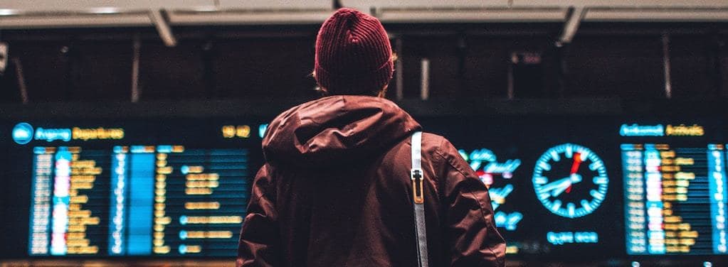 Hvor lenge før bør jeg være på flyplassen?